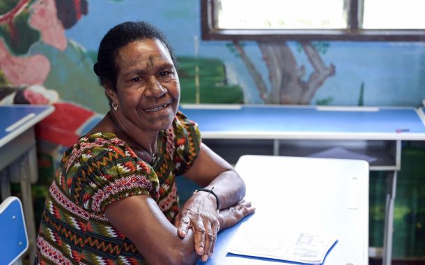 Alphabetisierung von Kindern und Erwachsenen